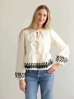 Embroidered Peplum Bow Blouse